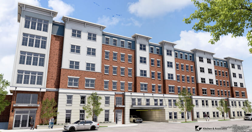 A modern six-story apartment building with red brick and white siding exterior, large windows, an entrance for vehicles in the center, parked cars, a few people walking, and trees on both sides of the street.